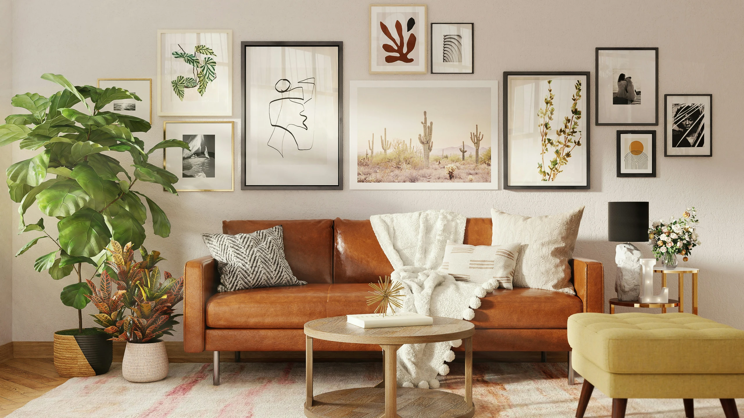 Bright and stylish living room with a caramel leather sofa, cozy throw pillows, and a modern gallery wall featuring a mix of abstract art and nature prints like cactus landscapes and botanical sketches. The wall decor adds warmth and personality to the space, complemented by lush indoor plants and elegant accents. A beautiful example of living room decor ideas for walls that combine earthy tones, organic elements, and curated artwork.