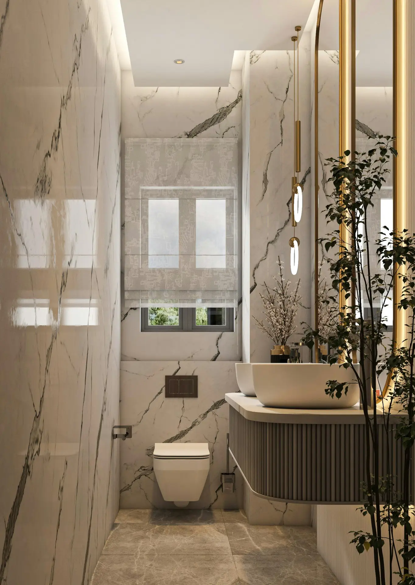 A luxurious narrow powder room presenting modern guest bathroom ideas. The walls are covered in large-format tiles featuring a striking light marbel design with bold grey veining. On the right, a floating curved vanity with a grey fluted base holds two white vessel sinks beneath elegant gold pendant lights and a tall gold-framed mirror. A modern wall-mounted toilet sits at the far end below a window dressed with a subtly patterned roman shade, while a tall indoor plant adds a touch of natural greenery in the foreground.